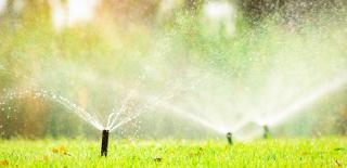 Stock image of lawn sprinklers